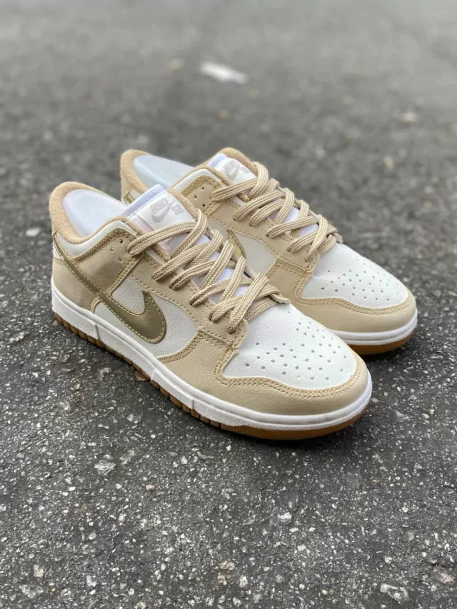 Tênis Nike Dunk Low - Branco e Dourado